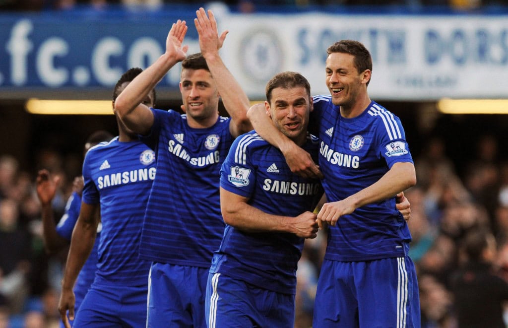 Chelsea's Garry Cahill (L), Branislav Ivanovic and Nemanja Matic celebrate after winning the English Premier League soccer match between Chelsea and Manchester United at Stamford Bridge stadium in London, Britain, 18 April 2015. (Photo by WILL OLIVER/EPA)