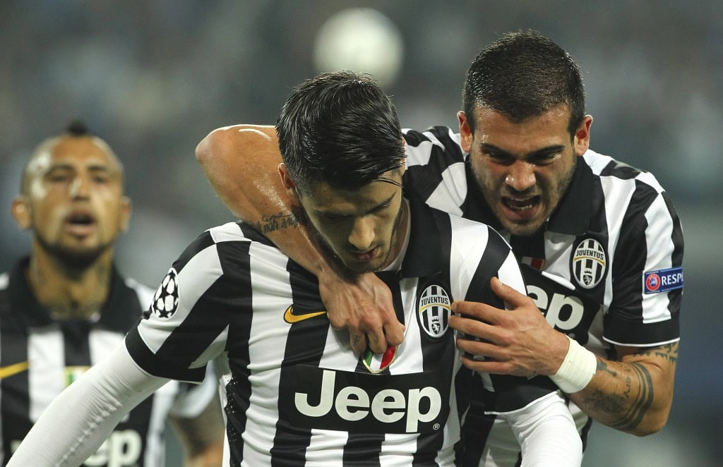 TURIN, ITALY - MAY 05: Alvaro Morata of Juventus FC celebrates with his team-mate Stefano Sturaro after scoring the opening goal during the UEFA Champions League semi final match between Juventus and Real Madrid CF at Juventus Arena on May 5, 2015 in Turin, Italy. (Photo by Marco Luzzani/Getty Images)