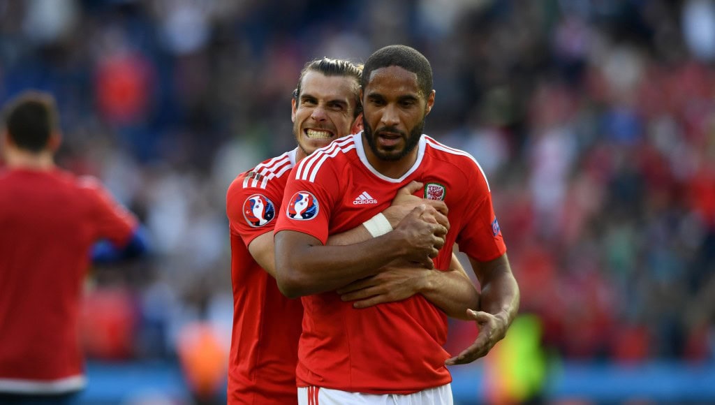 PARIS, FRANCE - JUNE 25: Wales players Gareth Bale (l) and Ashley Williams celebrate after the Round of 16 UEFA Euro 2016 match between Wales and Northern Ireland at Parc des Princes on June 25, 2016 in Paris, France. (Photo by Stu Forster/Getty Images)