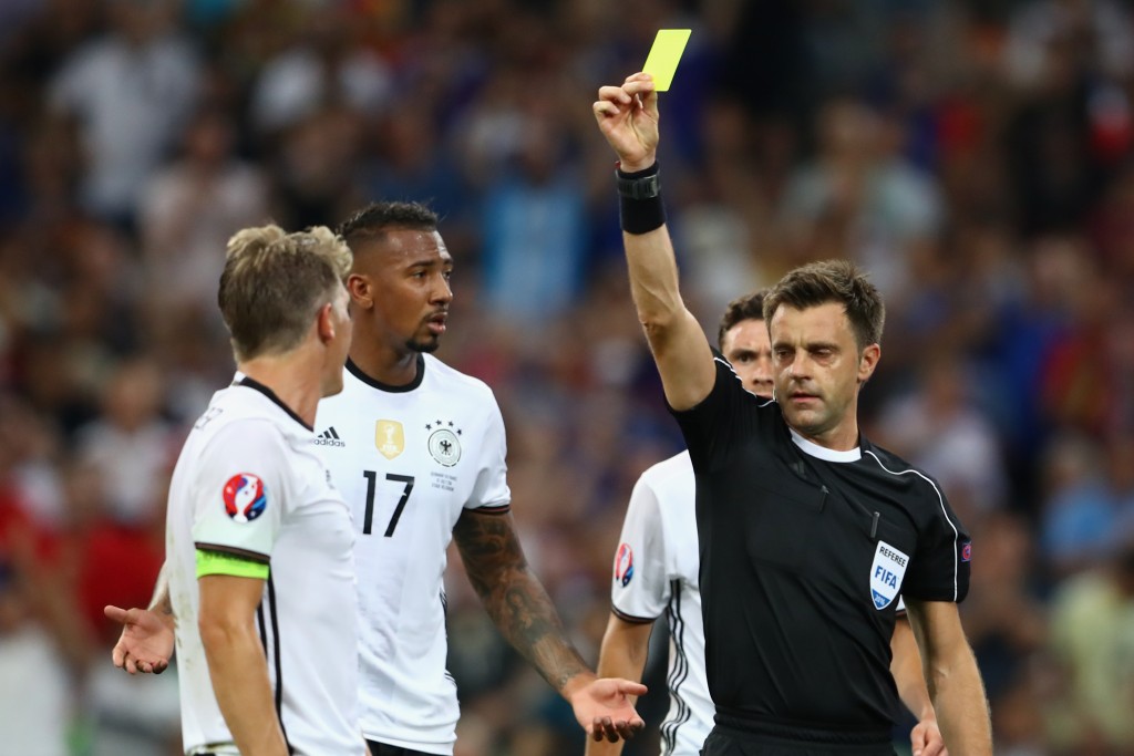MARSEILLE, FRANCE - JULY 07: Bastian Schweinsteiger of Germany reacts after being shown a yellow card by referee Nicola Rizzoli and conceding a penalty during the UEFA EURO semi final match between Germany and France at Stade Velodrome on July 7, 2016 in Marseille, France (Photo by Alexander Hassenstein/Getty Images)
