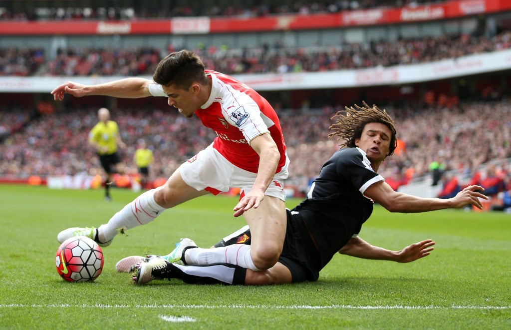 LONDON, ENGLAND - APRIL 02: Gabriel of Arsenal and Nathan Ake of Watford compete for the ball during the Barclays Premier League match between Arsenal and Watford at Emirates Stadium on April 2, 2016 in London, England. (Photo by Ian Walton/Getty Images)