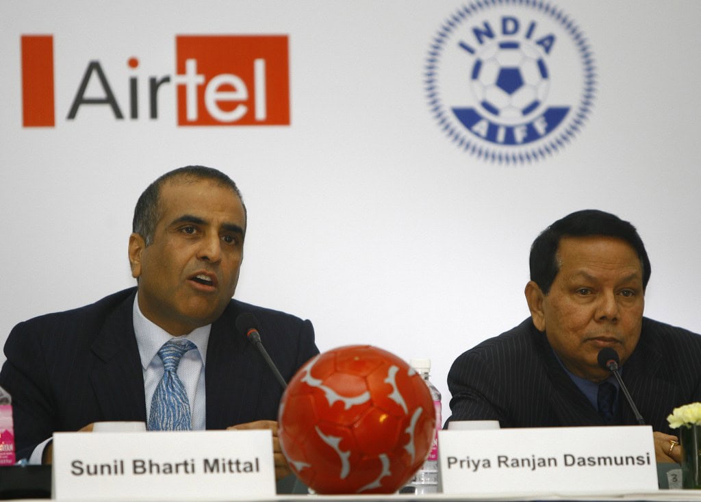 Chairman and Group Chief Executive Officer Bharti Enterprises Sunil Bharti Mittal (L) answers a question as President All India Football Federation (AIFF) Priya Ranjan Dasmunsi (R) looks on after signing a memorandum of understanding in New Delhi, 04 January 2008. Bharti and AIFF will build a comprehensive National Football Development Program (NFDP) and work together for the development of Indian football with the program aimed at delivering the vision of taking India to the World Cup. AIFF in partnership with Bharti, will also design and build a world class talent development programme. AFP PHOTO/ Manpreet ROMANA (Photo credit should read MANPREET ROMANA/AFP/Getty Images)
