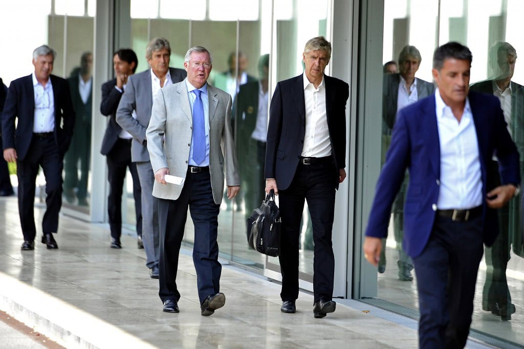 NYON, SWITZERLAND - SEPTEMBER 03: UEFA Elite Club Coaches Forum Chairman Sir Alex Ferguson and Arsenal FC Coach Arsene Wenger arrive for the UEFA Elite Club Coaches Forum at the UEFA headquarters, The House of European Football, on Spetember 3, 2014 in Nyon, Switzerland. (Photo by Harold Cunningham/Getty Images for UEFA)