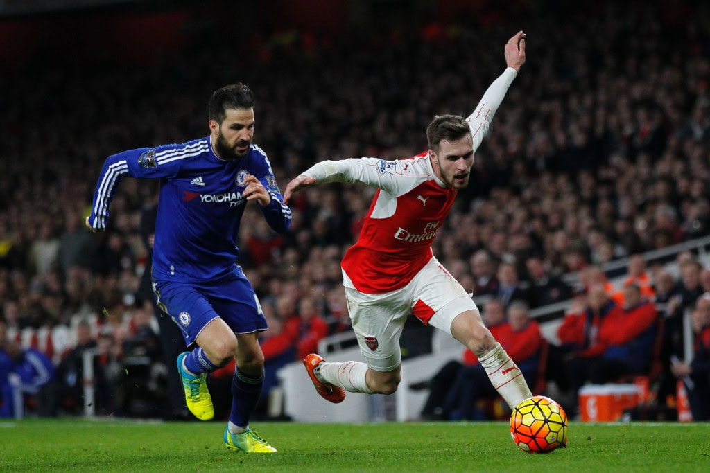 Chelsea's Spanish midfielder Cesc Fabregas (L) vies with Arsenal's Welsh midfielder Aaron Ramsey during the English Premier League football match between Arsenal and Chelsea at the Emirates Stadium in London on January 24, 2016. AFP PHOTO / IKIMAGES Could Ramsey return to England to join Chelsea, like former Arsenal captain Cesc Fabregas once did? (Photo by IKIMAGES/AFP/Getty Images)
