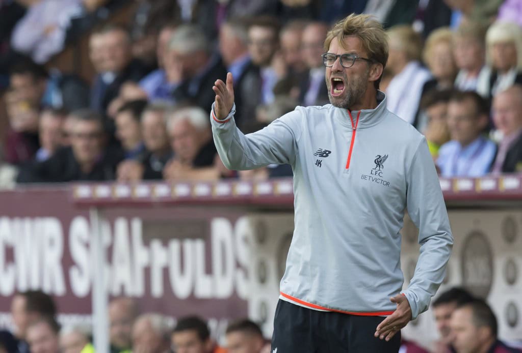 Liverpool's German manager Jurgen Klopp gestures on the touchline during the English Premier League football match between Burnley and Liverpool at Turf Moor in Burnley, north west England on August 20, 2016. / AFP / JON SUPER / RESTRICTED TO EDITORIAL USE. No use with unauthorized audio, video, data, fixture lists, club/league logos or 'live' services. Online in-match use limited to 75 images, no video emulation. No use in betting, games or single club/league/player publications. / (Photo credit should read JON SUPER/AFP/Getty Images)
