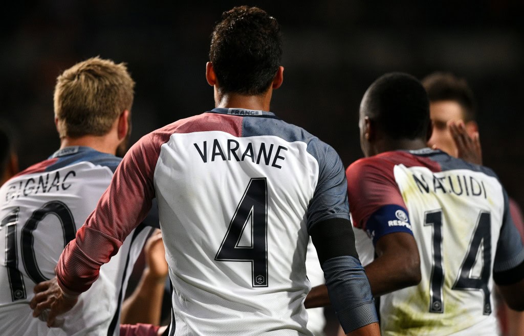 Raphael Varane took a tough decision and 'turned his back on his mentor' Jose Mourinho to stay and fight for his place at Santiago Bernabeu. (Picture Courtesy - AFP/Getty Images)