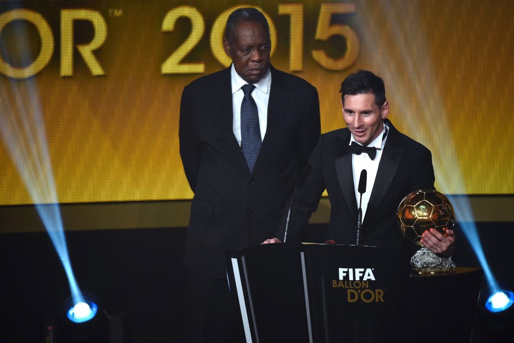 FC Barcelona and Argentina's forward Lionel Messi delivers a speech flanked by FIFA interim president Issa Hayatou (L) after receiving the 2015 FIFA Ballon dOr award for player of the year during the 2015 FIFA Ballon d'Or award ceremony at the Kongresshaus in Zurich on January 11, 2016. AFP PHOTO / OLIVIER MORIN / AFP / OLIVIER MORIN (Photo credit should read OLIVIER MORIN/AFP/Getty Images)