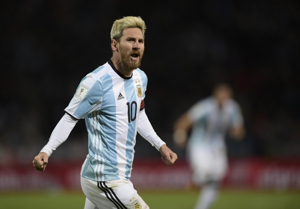 Argentina's Lionel Messi celebrates after scoring against Uruguay during the FIFA World Cup 2018 qualifier football match between Argentina and Uruguay in Mendoza, Argentina, on September 1, 2016. / AFP / JUAN MABROMATA