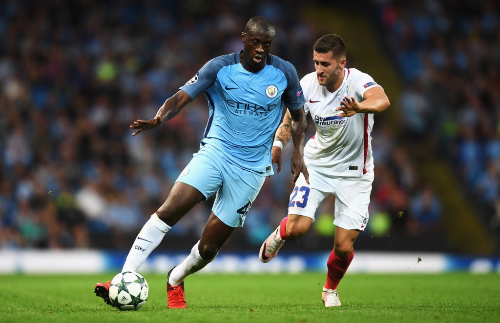 MANCHESTER, ENGLAND - AUGUST 24: Yaya Toure of Manchester City is closed down by Ovidiu Popescu of Steaua Bucharest during the UEFA Champions League Play-off Second Leg match between Manchester City and Steaua Bucharest at Etihad Stadium on August 24, 2016 in Manchester, England. (Photo by Michael Regan/Getty Images)