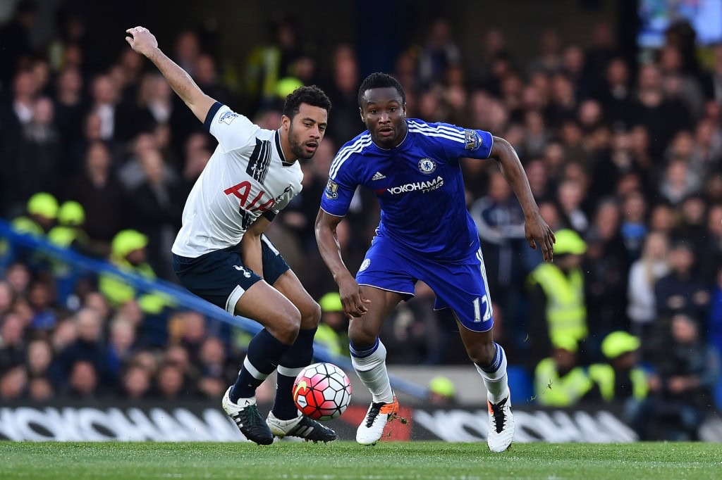 Tottenham Hotspur's Belgian midfielder Mousa Dembele (L) vies with Chelsea's Nigerian midfielder John Obi Mikel (R) during the English Premier League football match between Chelsea and Tottenham Hotspur at Stamford Bridge in London on May 2, 2016. / AFP / BEN STANSALL / RESTRICTED TO EDITORIAL USE. No use with unauthorized audio, video, data, fixture lists, club/league logos or 'live' services. Online in-match use limited to 75 images, no video emulation. No use in betting, games or single club/league/player publications. / (Photo credit should read BEN STANSALL/AFP/Getty Images)