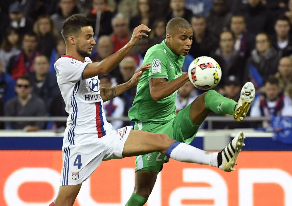 Saint-Etienne's French forward Kevin Monnet-Paquet (R) vies with Lyon's Argentin defender Emanuel Mammana (L) during the French L1 football match Olympique Lyonnais against AS Saint-Etienne on October 2, 2016, at the Parc Olympique Lyonnais in Decines-Charpieu near Lyon, southeastern France. / AFP / PHILIPPE DESMAZES (Photo credit should read PHILIPPE DESMAZES/AFP/Getty Images)