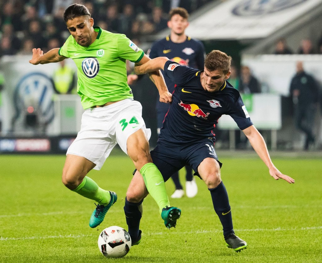 Wolfsburg's Swiss defender Ricardo Rodriguez (L) and RB Leipzig's forward Timo Werner vie for the ball during the German first division Bundesliga football match between VfL Wolfsburg and RB Leipzig, in Wolfsburg, central Germany, on October 16, 2016. / AFP / Odd ANDERSEN / RESTRICTIONS: DURING MATCH TIME: DFL RULES TO LIMIT THE ONLINE USAGE TO 15 PICTURES PER MATCH AND FORBID IMAGE SEQUENCES TO SIMULATE VIDEO. == RESTRICTED TO EDITORIAL USE == FOR FURTHER QUERIES PLEASE CONTACT DFL DIRECTLY AT + 49 69 650050 (Photo credit should read ODD ANDERSEN/AFP/Getty Images)