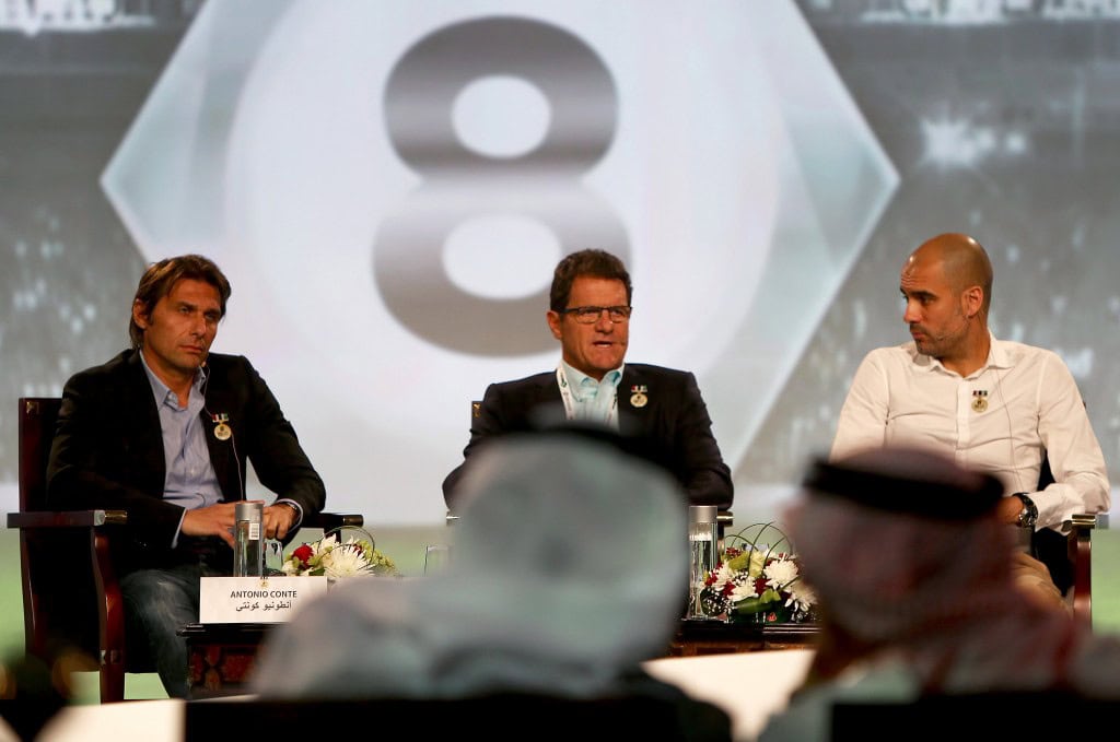 Juventus' Italian team manager Antonio Conte (L), Russia's coach Italian Fabio Capello (C) and Bayern Munich's Spanish head coach Pep Guardiola attend the first session of the 8th Dubai International Sports Conference on December 28, 2013 in Dubai. AFP PHOTO/MARWAN NAAMANI (Photo credit should read MARWAN NAAMANI/AFP/Getty Images)