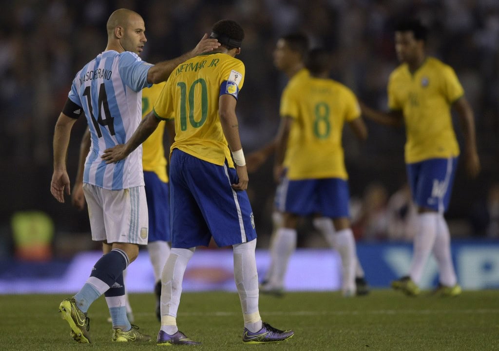 Argentina's Javier Mascherano (L) talks with Brazil's Neymar Jr. at the end of the Russia 2018 FIFA World Cup South American Qualifiers football match, in Buenos Aires, on November 13, 2015. AFP PHOTO / JUAN MABROMATA (Photo credit should read JUAN MABROMATA/AFP/Getty Images)