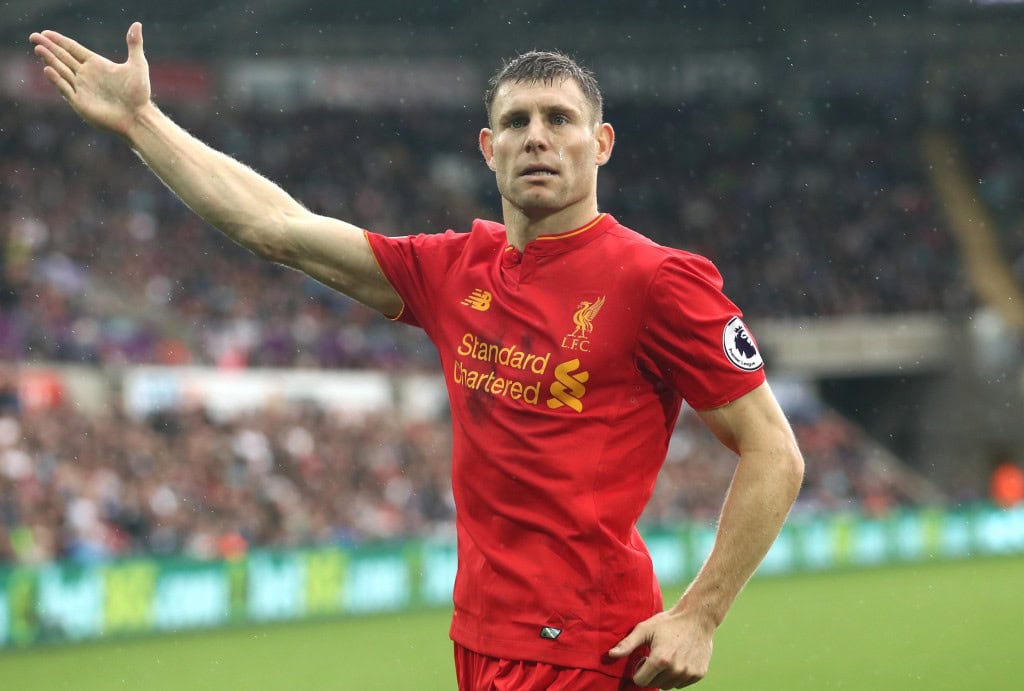 SWANSEA, WALES - OCTOBER 01: James Milner of Liverpool celebrates scoring his sides second goal during the Premier League match between Swansea City and Liverpool at Liberty Stadium on October 1, 2016 in Swansea, Wales. (Photo by Julian Finney/Getty Images)