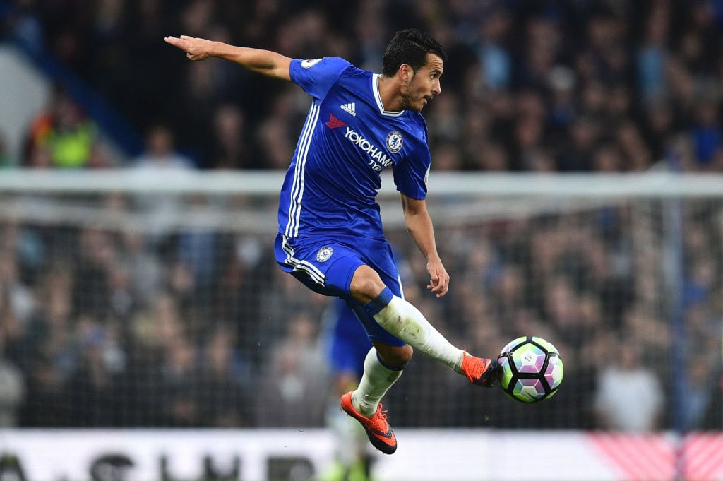 TOPSHOT - Chelsea's Spanish midfielder Pedro controls the ball during the English Premier League football match between Chelsea and Manchester United at Stamford Bridge in London on October 23, 2016. / AFP / GLYN KIRK / RESTRICTED TO EDITORIAL USE. No use with unauthorized audio, video, data, fixture lists, club/league logos or 'live' services. Online in-match use limited to 75 images, no video emulation. No use in betting, games or single club/league/player publications. / (Photo credit should read GLYN KIRK/AFP/Getty Images)