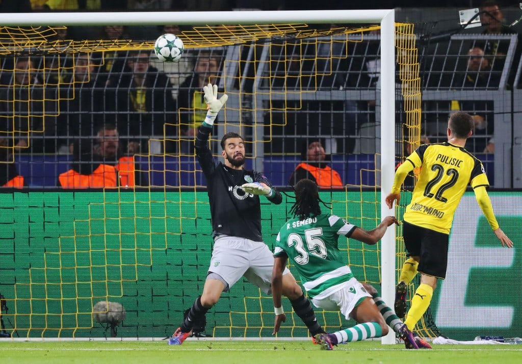 DORTMUND, GERMANY - NOVEMBER 02: Christian Pulisic of Borussia Dortmund (22) hits the crosssbar as he shoots past Rui Patricio of Sporting CP during the UEFA Champions League Group F match between Borussia Dortmund and Sporting Clube de Portugal at Signal Iduna Park on November 2, 2016 in Dortmund, Germany. (Photo by Simon Hofmann/Bongarts/Getty Images)