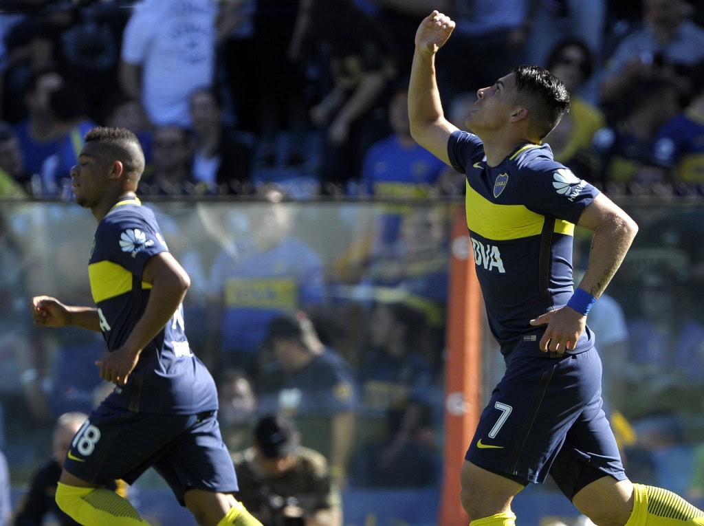 Boca Juniors' forward Cristian Pavon (R) celebrates after scoring a goal against Temperley during their Argentina First Division football match at La Bombonera stadium, in Buenos Aires, on October 29, 2016. / AFP / ALEJANDRO PAGNI (Photo credit should read ALEJANDRO PAGNI/AFP/Getty Images)