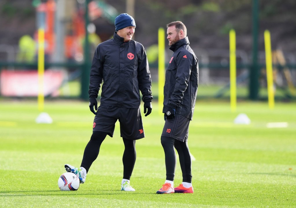 MANCHESTER, ENGLAND - NOVEMBER 23: Wayne Rooney and Bastian Schweinsteiger in discussion during a Manchester United training session on the eve of their UEFA Europa League match against Feyenoord at Aon Training Complex on November 23, 2016 in Manchester, England. (Photo by Gareth Copley/Getty Images)