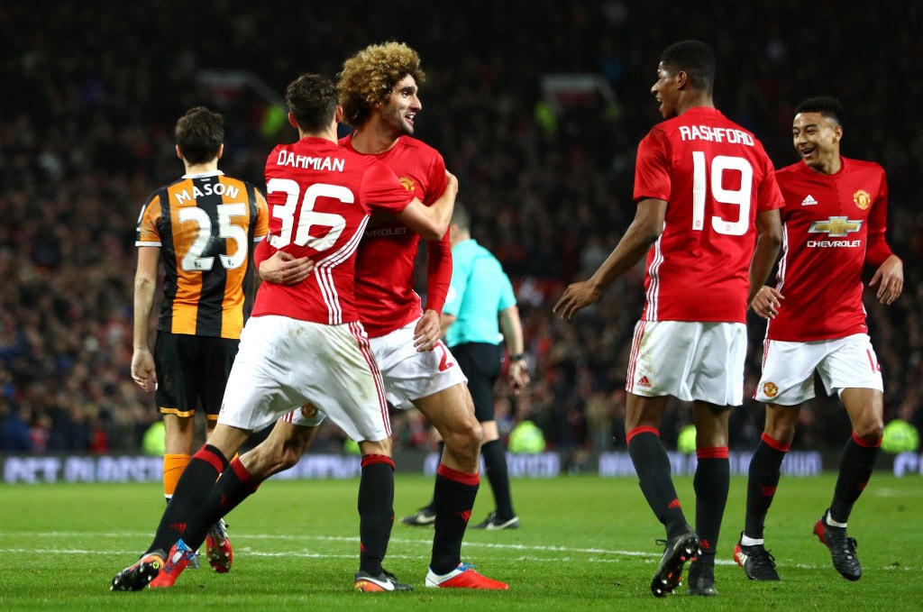 MANCHESTER, ENGLAND - JANUARY 10: Marouane Fellaini of Manchester United celebrates with team mates after scoring his sides second goal his sides second goal during the EFL Cup Semi-Final First Leg match between Manchester United and Hull City at Old Trafford on January 10, 2017 in Manchester, England. (Photo by Clive Mason/Getty Images)