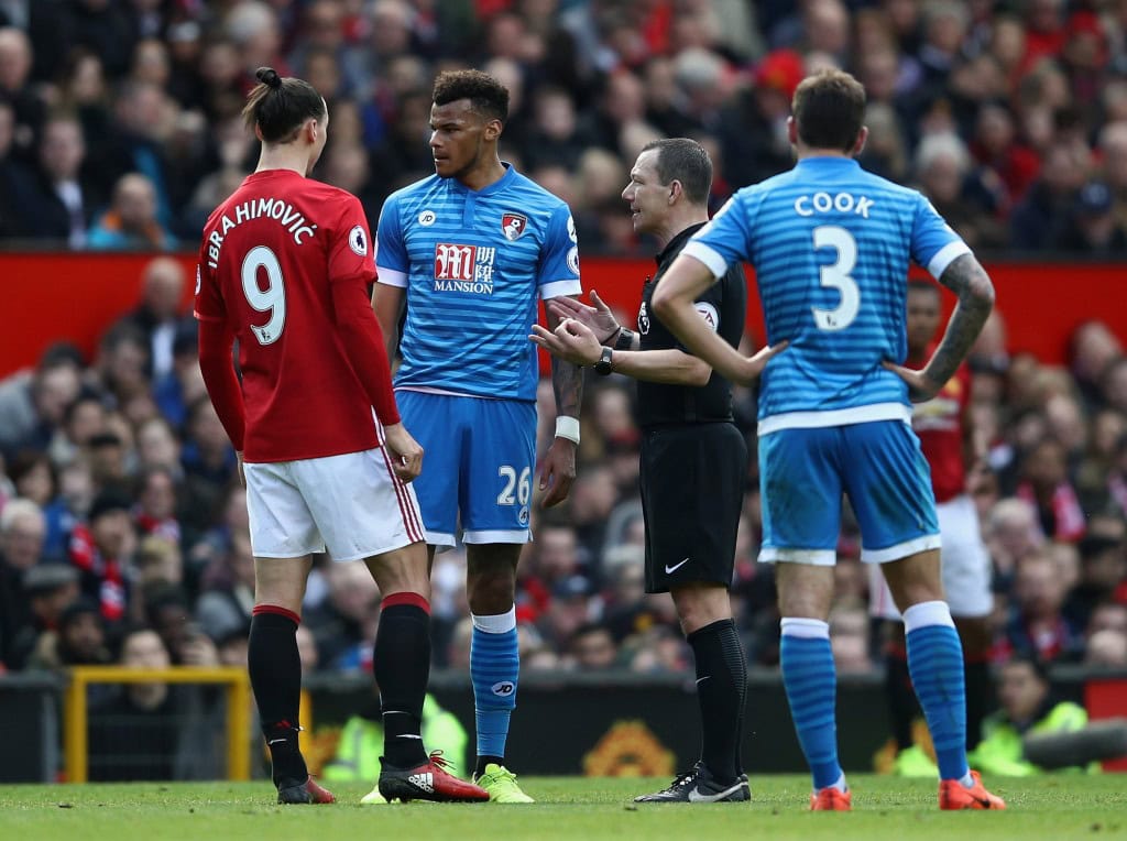 MANCHESTER, ENGLAND - MARCH 04: Tyrone Mings of Bournemouth and Zlatan Ibrahimovic of Manchester United clash during the Premier League match between Manchester United and AFC Bournemouth at Old Trafford on March 4, 2017 in Manchester, England. (Photo by Julian Finney/Getty Images)