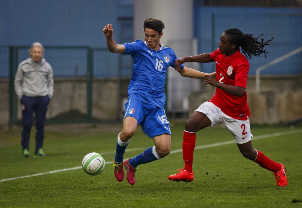 ZLIN, CZECH REPUBLIC - MARCH 31: Tafari Moore (R) of England competes for the ball with Francesco Cassata (L) of Italy during the UEFA U17 Championship Qualifier Elite Round match between Italy and England on March 31, 2014 in Zlin, Czech Republic. (Photo by Matej Divizna/Getty Images)