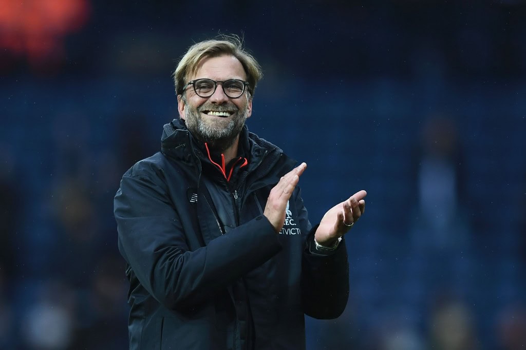 Liverpool's German manager Jurgen Klopp celebrates winning the English Premier League football match between West Bromwich Albion and Liverpool at The Hawthorns stadium in West Bromwich, central England, on April 16, 2017. / AFP PHOTO / Justin TALLIS / RESTRICTED TO EDITORIAL USE. No use with unauthorized audio, video, data, fixture lists, club/league logos or 'live' services. Online in-match use limited to 75 images, no video emulation. No use in betting, games or single club/league/player publications. / Bringing in the new era.(Photo credit should read JUSTIN TALLIS/AFP/Getty Images)