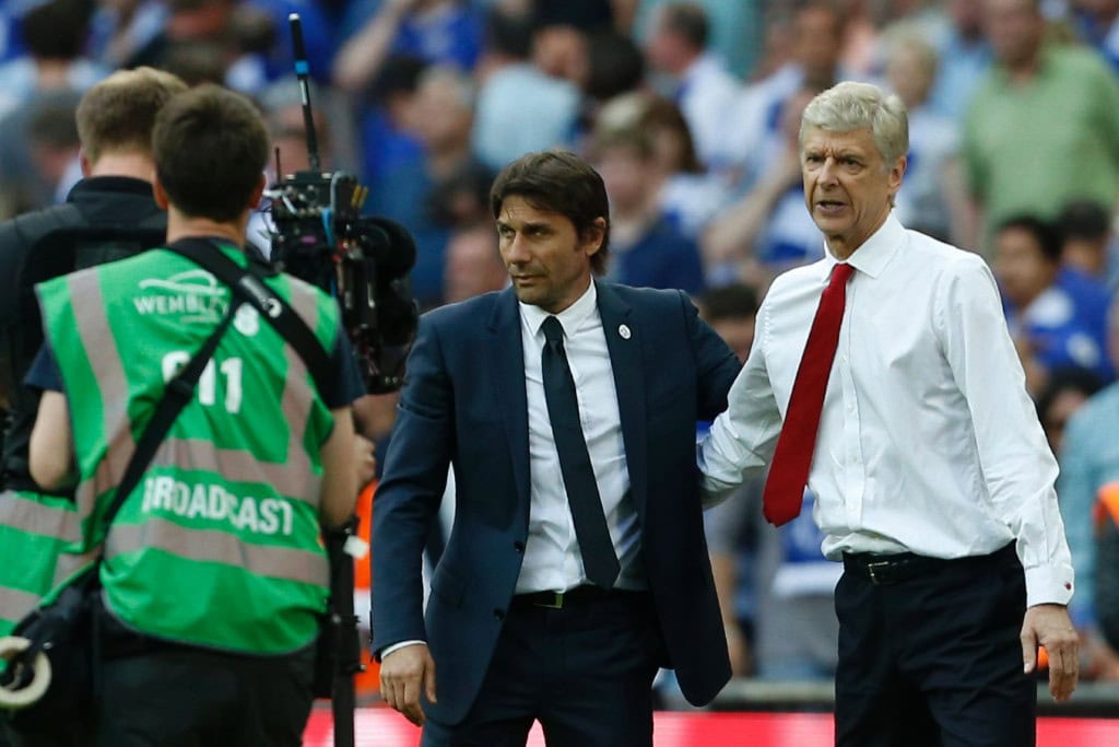 Two great managers with different battles to fight. (Picture Courtesy - AFP/Getty Images)