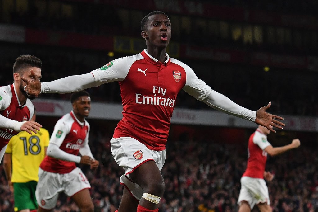 Arsenal's English striker Eddie Nketiah (C) celebrates scoring his team's first goal during the English League Cup fourth round football match between Arsenal and Norwich City at The Emirates Stadium in London on October 24, 2017. / AFP PHOTO / Ben STANSALL / RESTRICTED TO EDITORIAL USE. No use with unauthorized audio, video, data, fixture lists, club/league logos or 'live' services. Online in-match use limited to 75 images, no video emulation. No use in betting, games or single club/league/player publications. / (Photo credit should read BEN STANSALL/AFP/Getty Images)