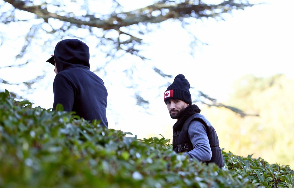 France's forward Nabil Fekir (R) and midfielder Corentin Tolisso arrive in Clairefontaine en Yvelines on November 6, 2017, as part of the team's preparation for the friendly football match against Wales and Germany. / AFP PHOTO / FRANCK FIFE (Photo credit should read FRANCK FIFE/AFP/Getty Images)