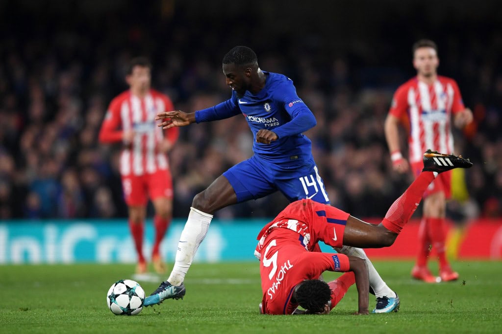 LONDON, ENGLAND - DECEMBER 05: Tiemoue Bakayoko of Chelsea gets away from Thomas Partey of Atletico Madrid during the UEFA Champions League group C match between Chelsea FC and Atletico Madrid at Stamford Bridge on December 5, 2017 in London, United Kingdom. (Photo by Shaun Botterill/Getty Images)