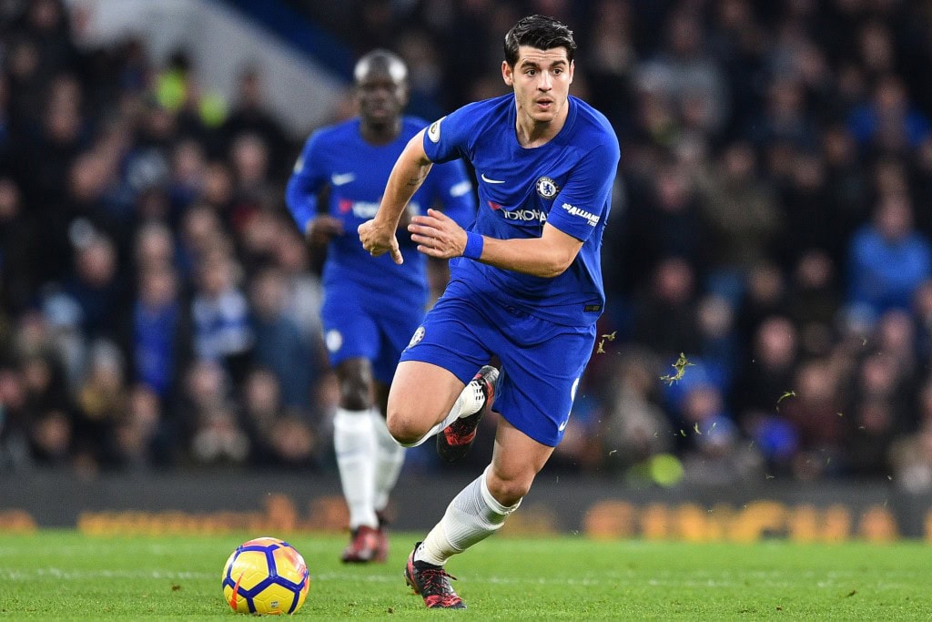 Chelsea's Spanish striker Alvaro Morata runs with the ball during the English Premier League football match between Chelsea and Brighton and Hove Albion at Stamford Bridge in London on December 26, 2017. / AFP PHOTO / Glyn KIRK / RESTRICTED TO EDITORIAL USE. No use with unauthorized audio, video, data, fixture lists, club/league logos or 'live' services. Online in-match use limited to 75 images, no video emulation. No use in betting, games or single club/league/player publications. / (Photo credit should read GLYN KIRK/AFP/Getty Images)