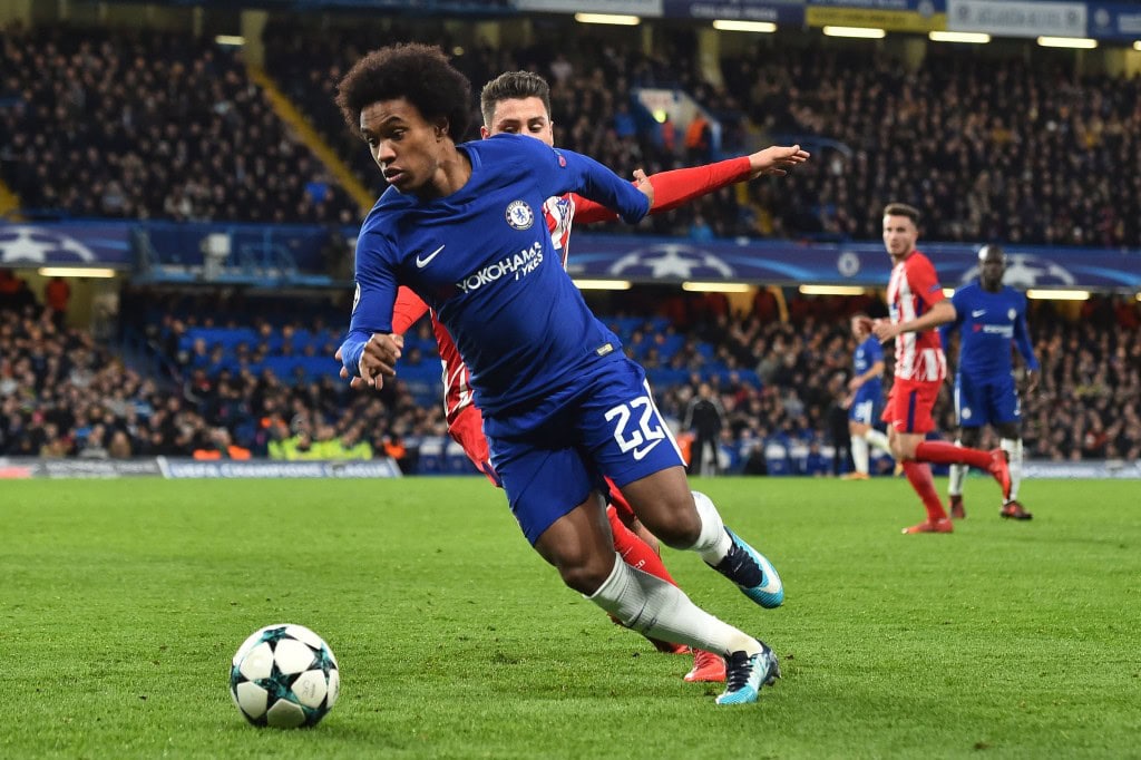 Chelsea's Brazilian midfielder Willian runs during a UEFA Champions League Group C football match between Chelsea and Atletico Madrid at Stamford Bridge in London on December 5, 2017. / AFP PHOTO / Glyn KIRK (Photo credit should read GLYN KIRK/AFP/Getty Images)