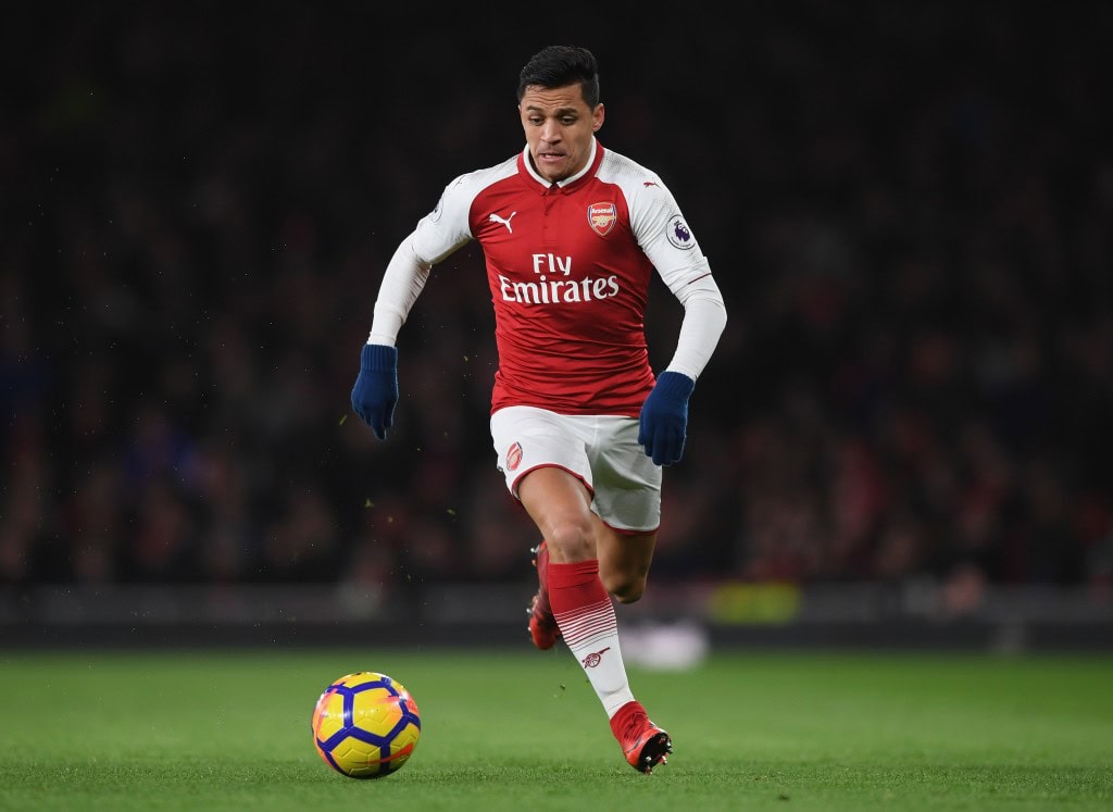 LONDON, ENGLAND - JANUARY 03: Alexis Sanchez of Arsenal runs with ball during the Premier League match between Arsenal and Chelsea at Emirates Stadium on January 3, 2018 in London, England. (Photo by Shaun Botterill/Getty Images)