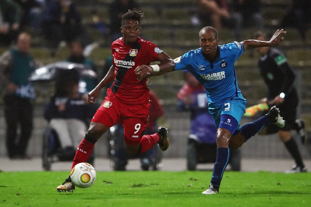 KARLSRUHE, GERMANY - AUGUST 11: Leon Bailey of Leverkusen eludes David Pisot of Karlsruhe during the DFB Cup first round match between Karlsruher SC and Bayer Leverkusen at Wildparkstadion on August 11, 2017 in Karlsruhe, Germany. (Photo by Alex Grimm/Bongarts/Getty Images)