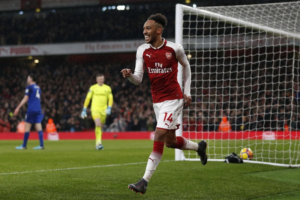 Arsenal's Gabonese striker Pierre-Emerick Aubameyang celebrates scoring the team's fourth goal during the English Premier League football match between Arsenal and Everton at the Emirates Stadium in London on February 3, 2018. / AFP PHOTO / IKIMAGES / Ian KINGTON / RESTRICTED TO EDITORIAL USE. No use with unauthorized audio, video, data, fixture lists, club/league logos or 'live' services. Online in-match use limited to 45 images, no video emulation. No use in betting, games or single club/league/player publications. / (Photo credit should read IAN KINGTON/AFP/Getty Images)