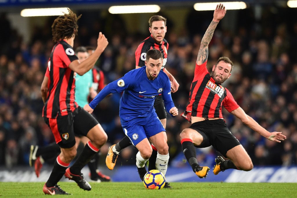Chelsea's Belgian midfielder Eden Hazard (C) controls the ball during the English Premier League football match between Chelsea and Bournemouth at Stamford Bridge in London on January 31, 2018. / AFP PHOTO / Glyn KIRK / RESTRICTED TO EDITORIAL USE. No use with unauthorized audio, video, data, fixture lists, club/league logos or 'live' services. Online in-match use limited to 75 images, no video emulation. No use in betting, games or single club/league/player publications. / (Photo credit should read GLYN KIRK/AFP/Getty Images)
