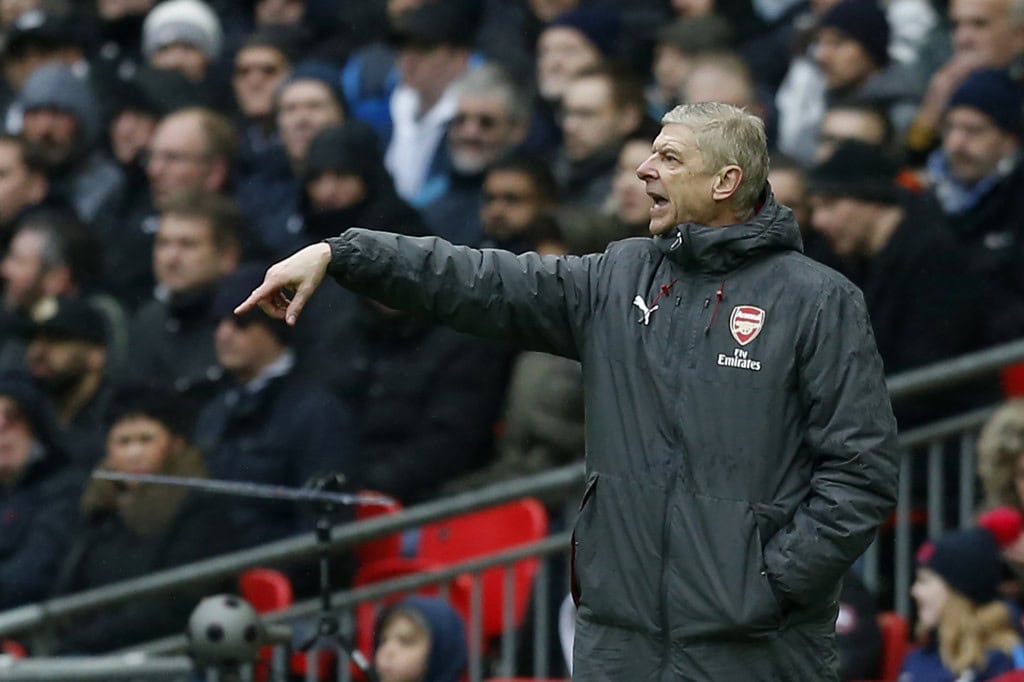Arsenal's French manager Arsene Wenger gestures from the touchline during the English Premier League football match between Tottenham Hotspur and Arsenal at Wembley Stadium in London, on February 10, 2018. / AFP PHOTO / IKIMAGES / Ian KINGTON / RESTRICTED TO EDITORIAL USE. No use with unauthorized audio, video, data, fixture lists, club/league logos or 'live' services. Online in-match use limited to 45 images, no video emulation. No use in betting, games or single club/league/player publications. / (Photo credit should read IAN KINGTON/AFP/Getty Images)