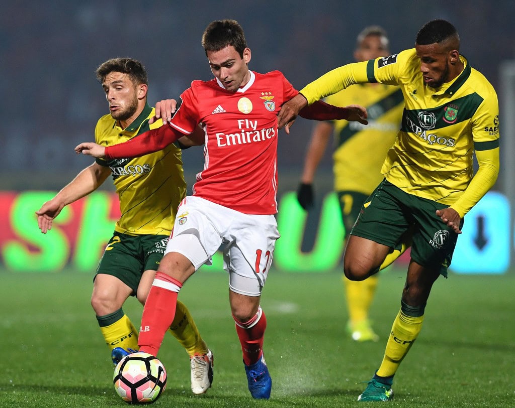 Benfica's Serbian forward Andrija Zivkovic (C) vies with Pacos de Ferreira's midfielder Pedrinho (L) and Brazilian defender Bruno Santos during the Portuguese league football match FC Pacos de Ferreira vs SL Benfica at the Capital do Movel stadium in Pacos de Ferreira on March 18, 2017. / AFP PHOTO / FRANCISCO LEONG (Photo credit should read FRANCISCO LEONG/AFP/Getty Images)