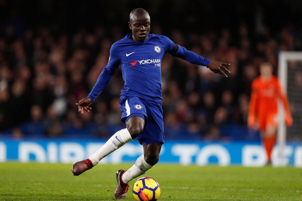 Chelsea's French midfielder N'Golo Kante plays the ball during the English Premier League football match between Chelsea and Crystal Palace at Stamford Bridge in London on March 10, 2018. / AFP PHOTO / Adrian DENNIS / RESTRICTED TO EDITORIAL USE. No use with unauthorized audio, video, data, fixture lists, club/league logos or 'live' services. Online in-match use limited to 75 images, no video emulation. No use in betting, games or single club/league/player publications. / (Photo credit should read ADRIAN DENNIS/AFP/Getty Images)