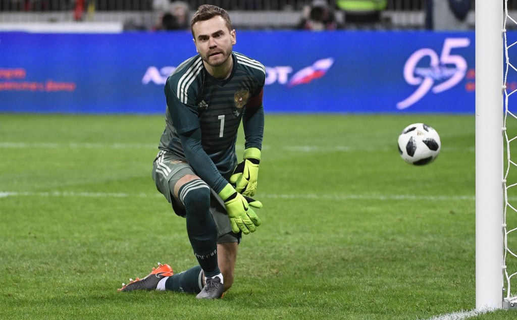 Russia's goalkeeper Igor Akinfeev reacts after failing to stop a goal from a penalty spot scored by Brazil's midfielder Philippe Coutinho during an international friendly football match between Russia and Brazil at the Luzhniki stadium in Moscow on March 23, 2018. / AFP PHOTO / Alexander NEMENOV (Photo credit should read ALEXANDER NEMENOV/AFP/Getty Images)