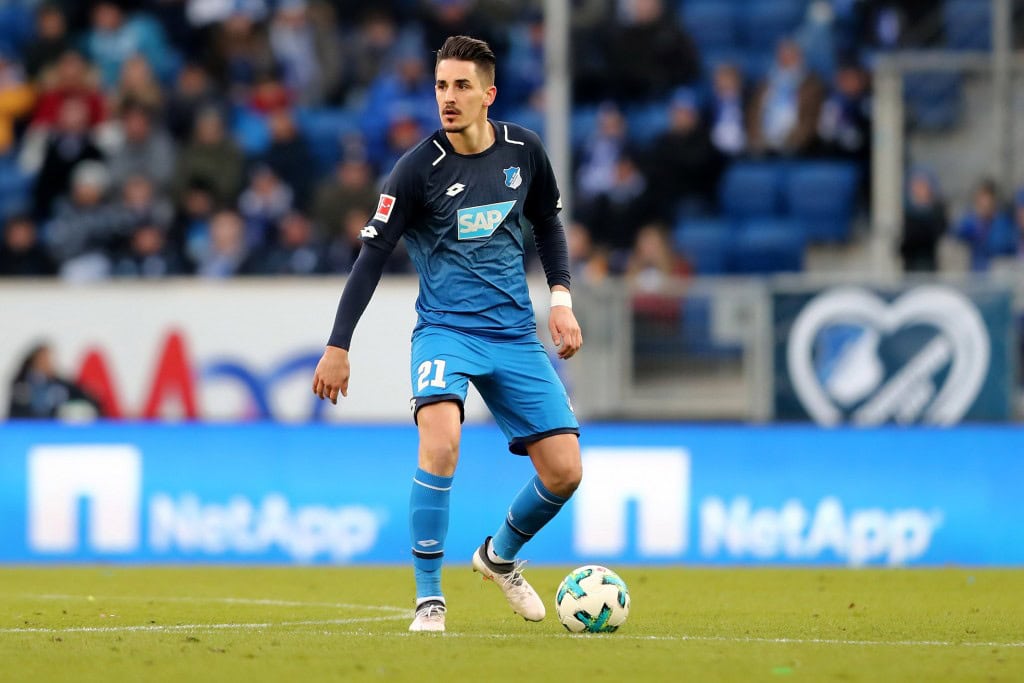 SINSHEIM, GERMANY - FEBRUARY 24: Benjamin Huebner of Hoffenheim runs with the ball during the Bundesliga match between TSG 1899 Hoffenheim and Sport-Club Freiburg at Wirsol Rhein-Neckar-Arena on February 24, 2018 in Sinsheim, Germany. The match between Hoffenheim and Freiburg ended 1-1. (Photo by Christof Koepsel/Bongarts/Getty Images)