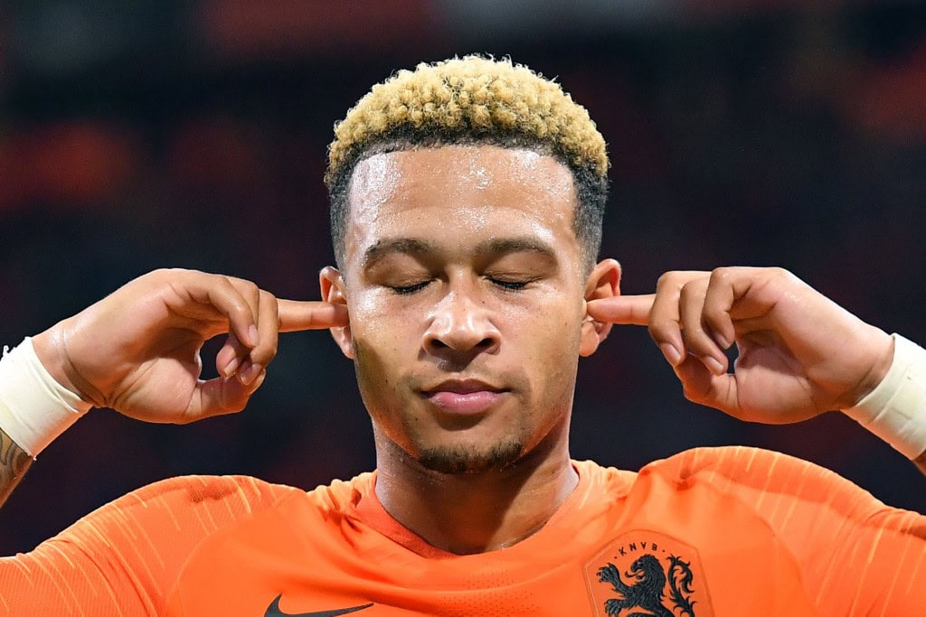 Can't hear the haters. (Photo by Emmanuel Dunand/AFP/Getty Images)