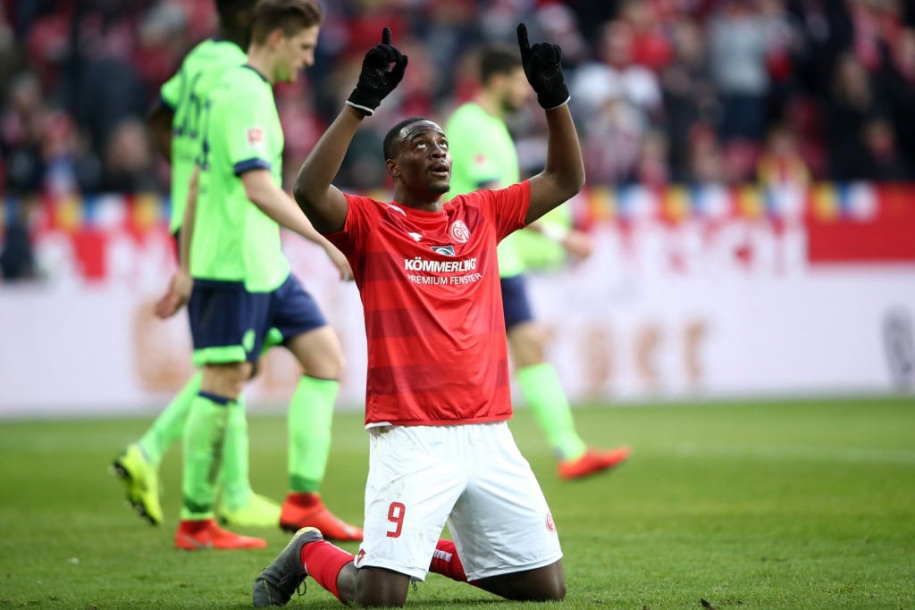 MAINZ, GERMANY - FEBRUARY 23: Jean-Philippe Mateta of FSV Mainz celebrates at the final whistle during the Bundesliga match between 1. FSV Mainz 05 and FC Schalke 04 at Opel Arena on February 23, 2019 in Mainz, Germany. (Photo by Alex Grimm/Bongarts/Getty Images)
