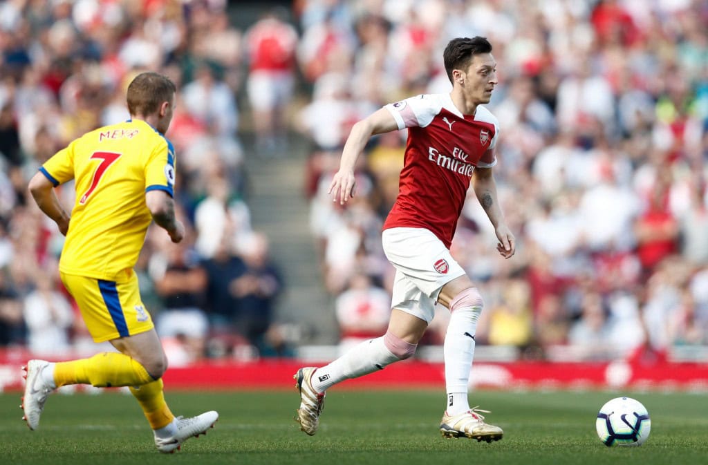 Ozil was impressive. (Photo by Adrian Dennis/AFP/Getty Images)