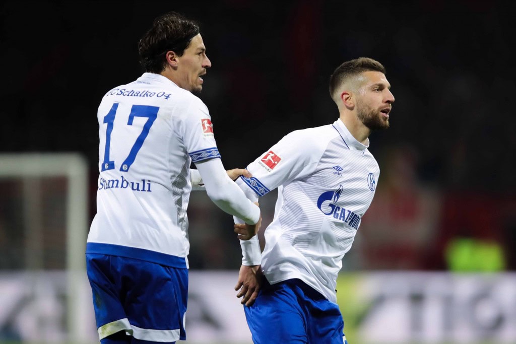 NUREMBERG, GERMANY - APRIL 12: Matija Nastasic of FC Schalke 04 celebrates with his team mate after Benjamin Stambouli scoring his team's first goal during the Bundesliga match between 1. FC Nuernberg and FC Schalke 04 at Max-Morlock-Stadion on April 12, 2019 in Nuremberg, Germany. (Photo by Alexander Hassenstein/Bongarts/Getty Images)