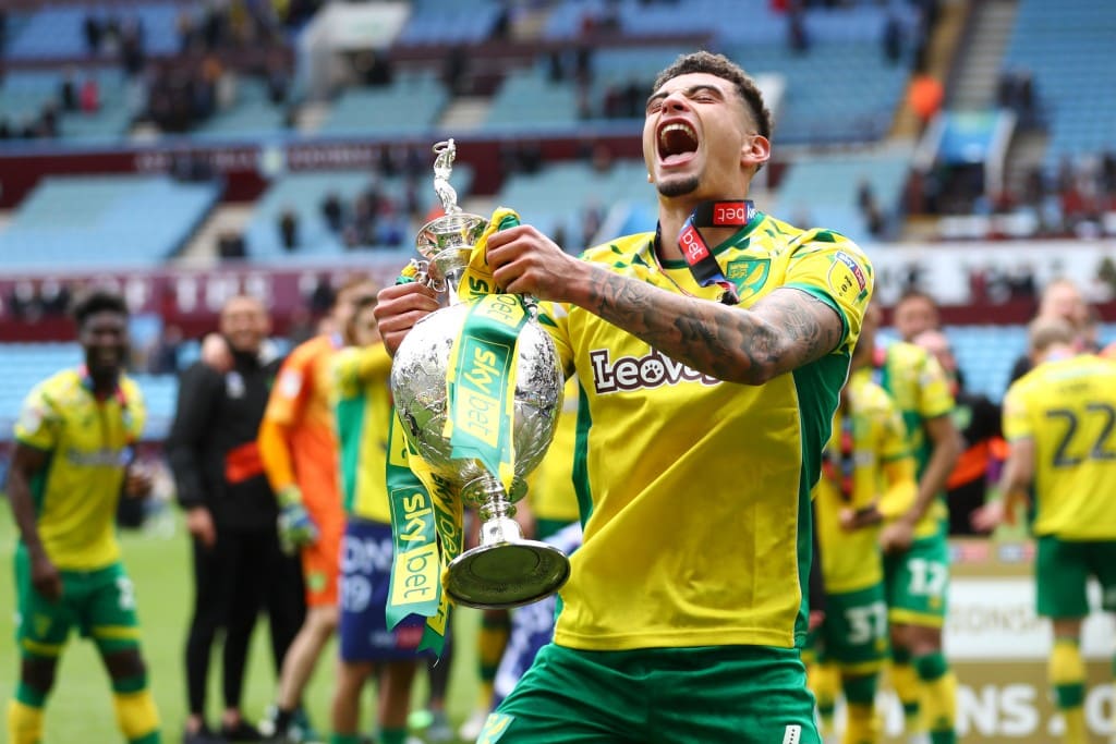 Having tasted success at the Championship level, could Godfrey leave Norwich for Manchester United? (Picture Courtesy - AFP/Getty Images)
