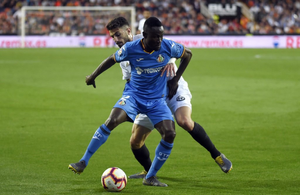 Djene Dakonam wanted by Arsenal and Everton (Photo by JOSE JORDAN/AFP/Getty Images)