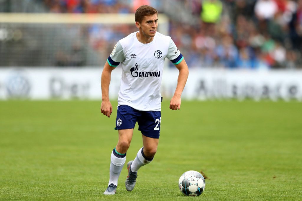 DROCHTERSEN, GERMANY - AUGUST 10: Jonjoe Kenny of Schalke runs with the ball during the DFB Cup first round match between SV Drochtersen Assel and FC Schalke 04 at Kehdinger Stadion on August 10, 2019 in Drochtersen, Germany. (Photo by Martin Rose/Bongarts/Getty Images)