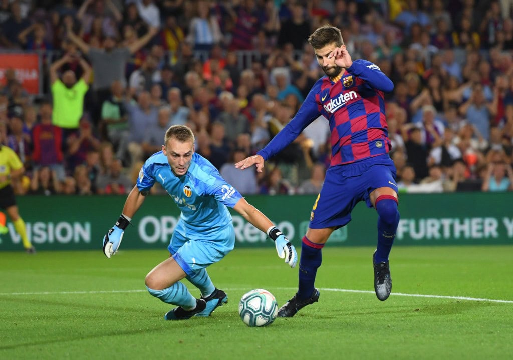 Pique scored Barcelona's third goal (Photo by Alex Caparros/Getty Images)